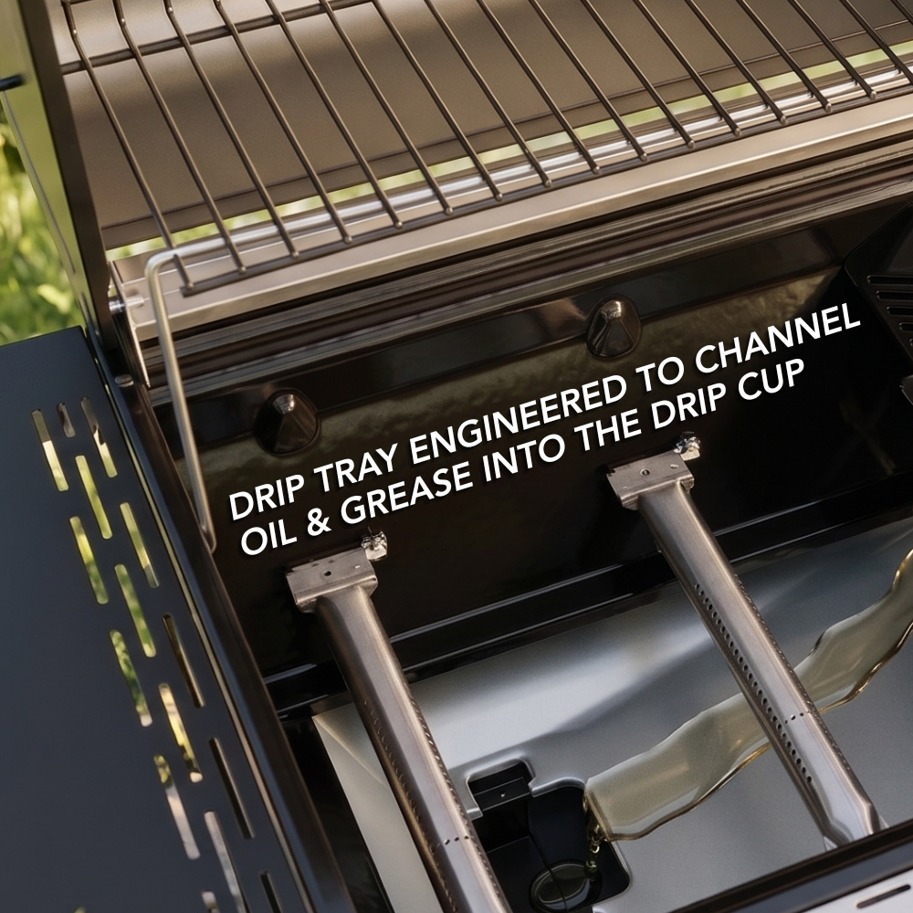 Close-up of the interior of a gas barbecue firebox with stainless steel burners and oil dripping down the drip tray into grease cup on the Wabaya Max Gas BBQ